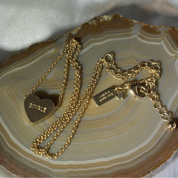 kate spade Jewelry - KATE SPADE 12K GOLD PLATED TAKE HEART PENDANT SAYS.SINGLE/TAKEN NECKLACE